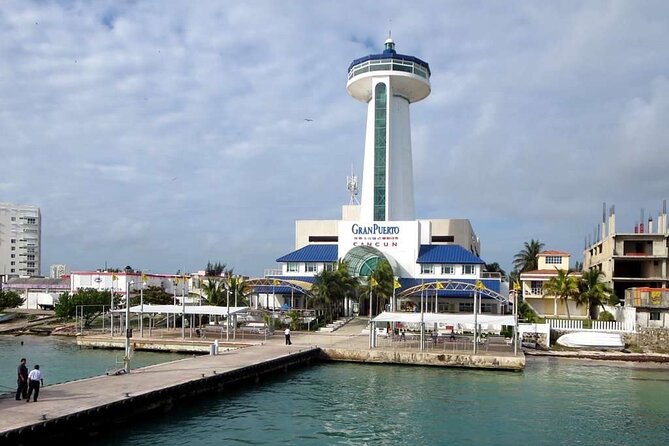 Round Ferry Transfer from Tortugas to Isla Mujeres - Arriving at the API Dock in Isla Mujeres