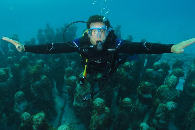 Scuba Diving Under Water Museum and Reef for beginners - Manchones Reef adds the natural side of the morning