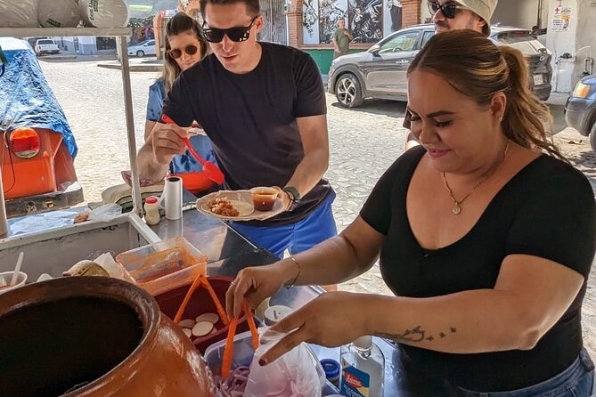 Signature Taco Tour in PV with Vallarta Eats - Shopping for chiles at the local market