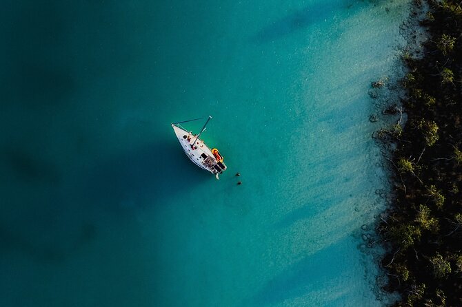 Sunset Sailing Tour in Bacalar with Outdoor Bar and Lunch - Swimming at the Canal de los Piratas