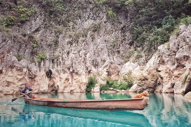 Tamul waterfall and water cave on a wooden canoe - 12:15 Tamul Waterfall from the river