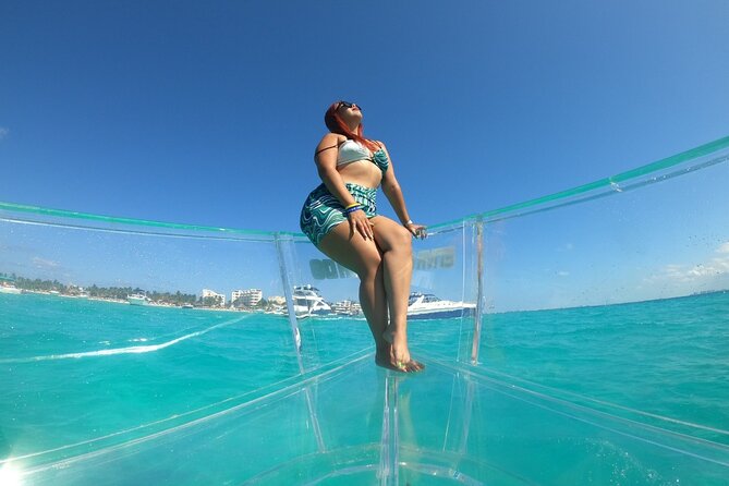 Tour Isla Mujeres excursion in Collective Transparent Boat - Families, grandparents, and first-time boat riders