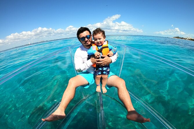 Tour Isla Mujeres excursion in Collective Transparent Boat - Through La Carbonera and back to the marina