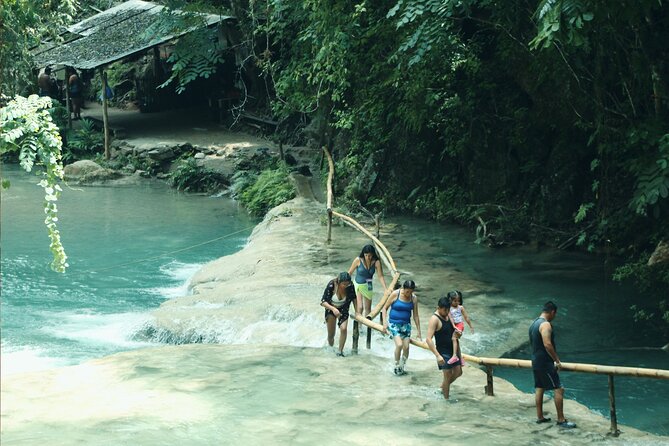 Tour to Copalitilla Magical Waterfalls from Huatulco with admission included - Swimming, caves, bridges, and the cold water