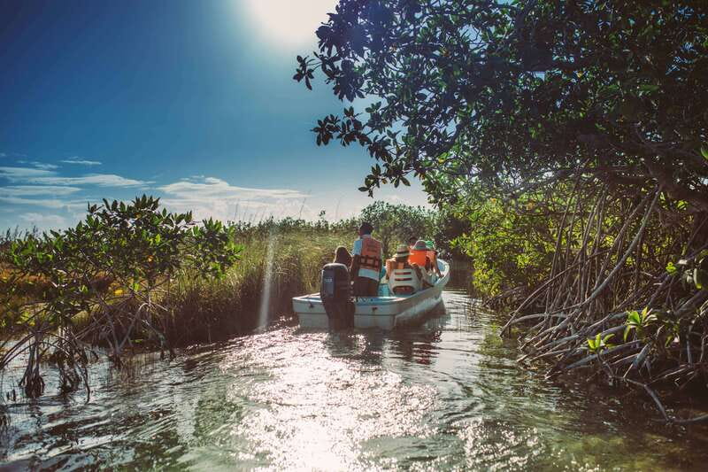 Tulum: Mayan Ruins & Sian Kaan Tour with Boat Ride and Lunch - Ancient Maya ruins before the water