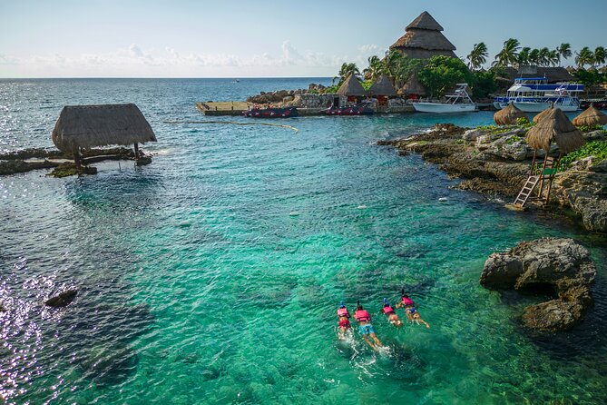 Xcaret Park Day Trip, transportation and Cultural Night Show - Swimming the underground rivers